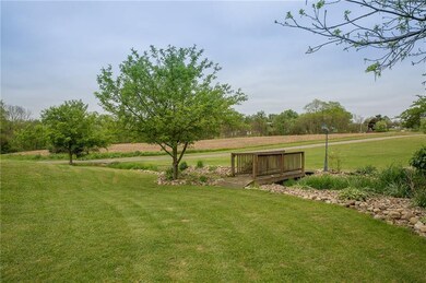 Quaint wooded bridge adds to the charm and serenit