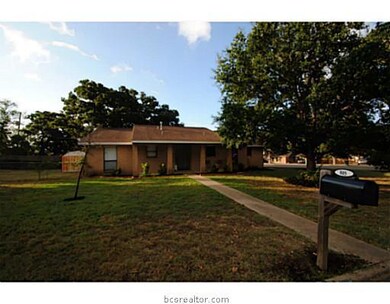 Exterior Front. Large corner lot with side entry garage