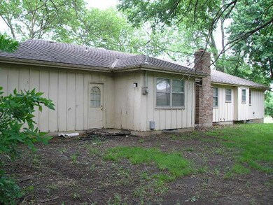 Rear View, siding show wear at the end toward grou