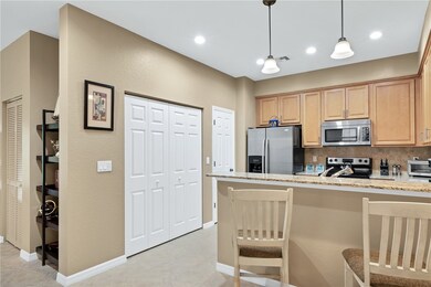 Kitchen w/laundry closet.  LED lighting.  Kitchen