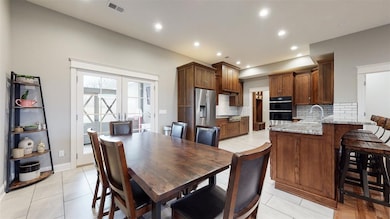 Spacious dining room with custom built-in china ca