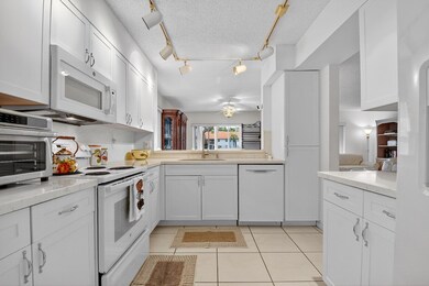 7390 Lake Meadow Way unit 101, Boynton Beach, FL 33437 - photo 4