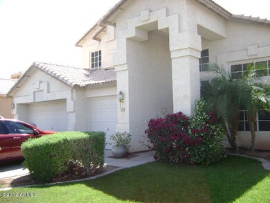 Lovely Front Yard with 3 Car Garage