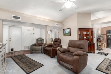 Living Area with Kitchen behind