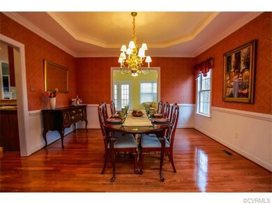 Gorgeous details like a tray ceiling, HW floors, c