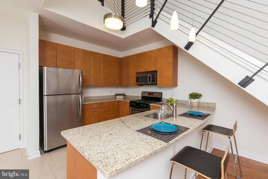 Village Lofts unit 413, Baltimore, MD 21218 - photo 7