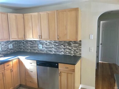 Attractive back splash adds nicely to the bright k