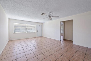 9186 W Highland Pines Blvd, Palm Beach Gardens, FL 33418 - photo 2