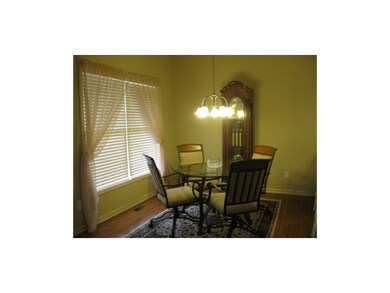 Breakfast Room.  Beautifully maintained Hardwood F
