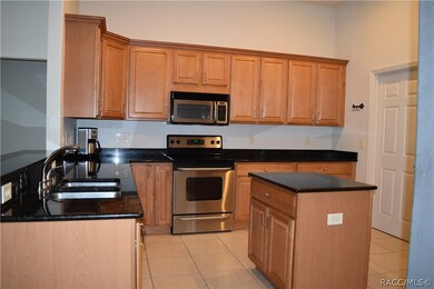 Stainless appliances, granite counters, wood cabin