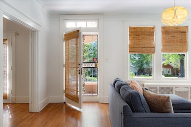 Doorway to outside featuring light wood-type floor