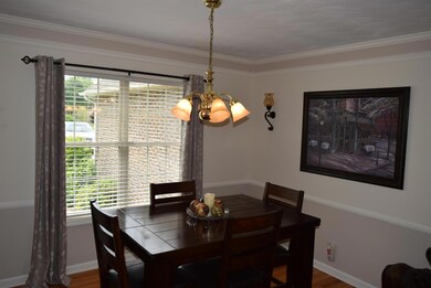 Separate dining room with hardwood floors