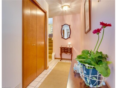 Entry Foyer has ceramic tile and large double gues