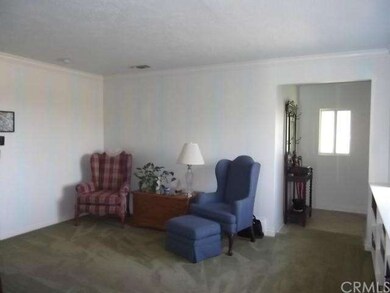 Formal entry leading into living room.