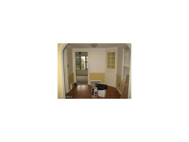 Dining room that leads to family room. hardwood fl