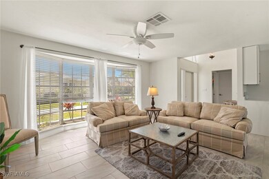 Living area featuring ceiling fan