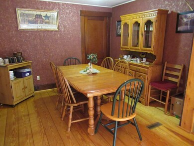 Dining room is located between the kitchen and the