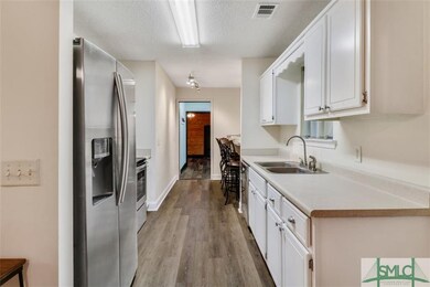 Kitchen with Breakfast Bar ~ New Flooring