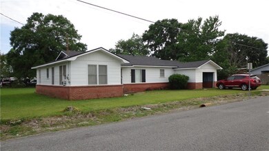 Angled View of front and East side of home from st