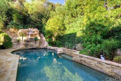 Lovely Stone Pool with Water Slide and Fountain
