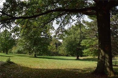 Gorgeous backyard view of 1 acre lot.