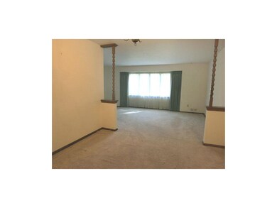 The living room opens to the formal dining room.