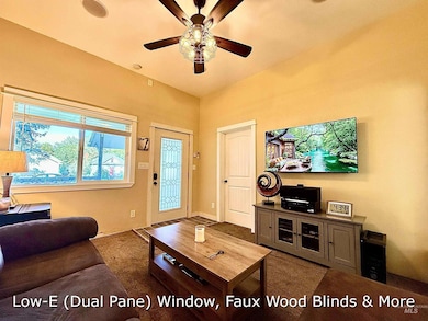 $11,500 Living Room Remodel -NEW CARPET AND PAD WILL BE INSTALLED DURING 14 DAY SELLER LEASE BACK, Leaded Glass Entry Door, Storm Door, Surround Sound, Ceiling Fan, Tile Floor Entry, Pellet Stove recently serviced, (TILE PAD BEING INSTALLED), Ethernet