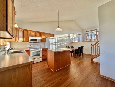 The composite flooring not only beautiful but very durable as well. This kitchen is spacious and bright and very user friendly.