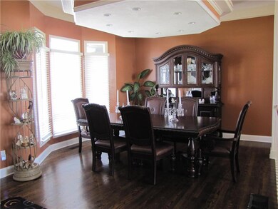 Beautiful Formal Dining area with custom ceiling!