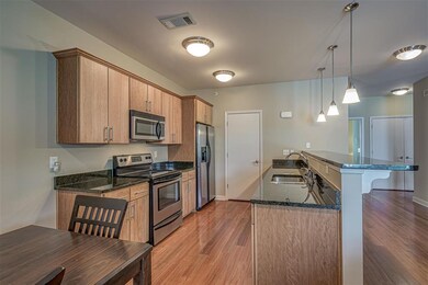 Modern Linear Kitchen Features Smooth Ceilings, Co