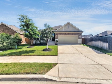 Craftsman inspired home featuring brick siding, a