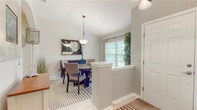 Separate dining room with tile flooring