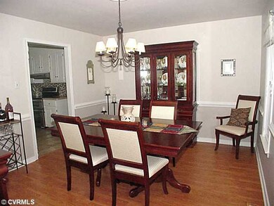 Dining Room - Dining room with laminate floor, cha