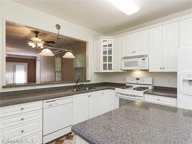 Kitchen. Large kitchen with dual fuel stove and solid surface counters