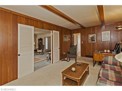 Off the living room is the inviting and comfortabl