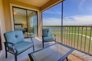 Balcony with golf course and water view