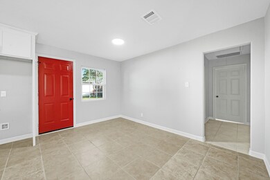 A lovely dining area rests adjacent to the kitchen, creating easy dinner service.