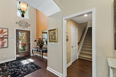 entry & stairs to game room & one bedroom suite