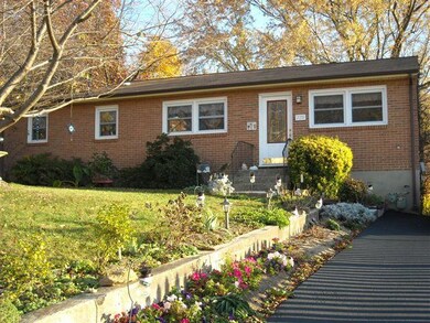 Front showing one of two driveways