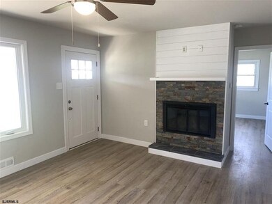 With Wood burning fireplace