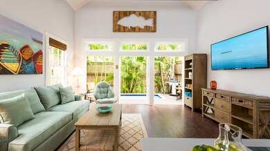 4-1103FLEMING-16x9-livingroom&pool
