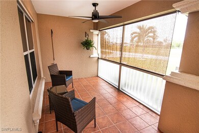Sunroom / solarium featuring ceiling fan