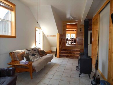 Family room with wood stove and...