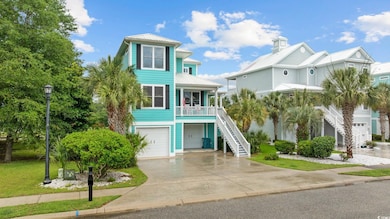 Coastal inspired home featuring stairway, concrete driveway, an attached garage, metal roof, and a porch
