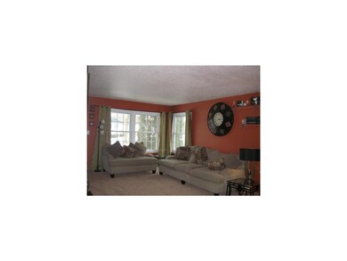 Great Room. Spacious great room with newer carpet 