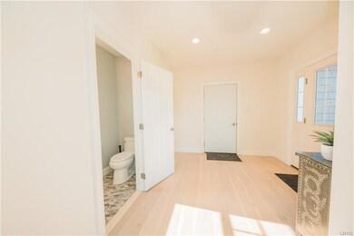 Entryway and Bathroom