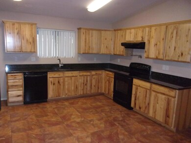 KITCHEN W HICKORY CABINETS