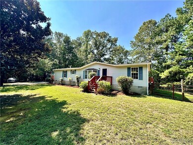 View of front of house with a front yard