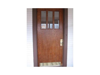 Other. Solid wood front door with viewing windows
