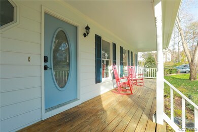 Lovely covered country front porch.